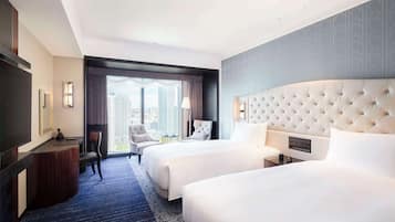 Hypo-allergenic bedding available, down comforters, in-room safe