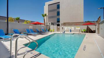 Outdoor pool, pool umbrellas, sun loungers