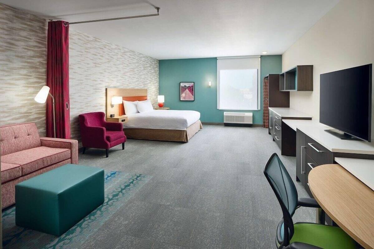 Desk, laptop workspace, free WiFi, bed sheets