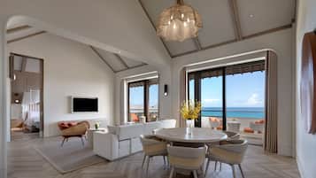 Suite Premium, 1 cama de matrimonio grande, vistas al mar | Zona de estar | Televisión LCD de 42 pulgadas con canales por cable