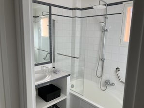 Hair dryer, towels, soap, toilet paper