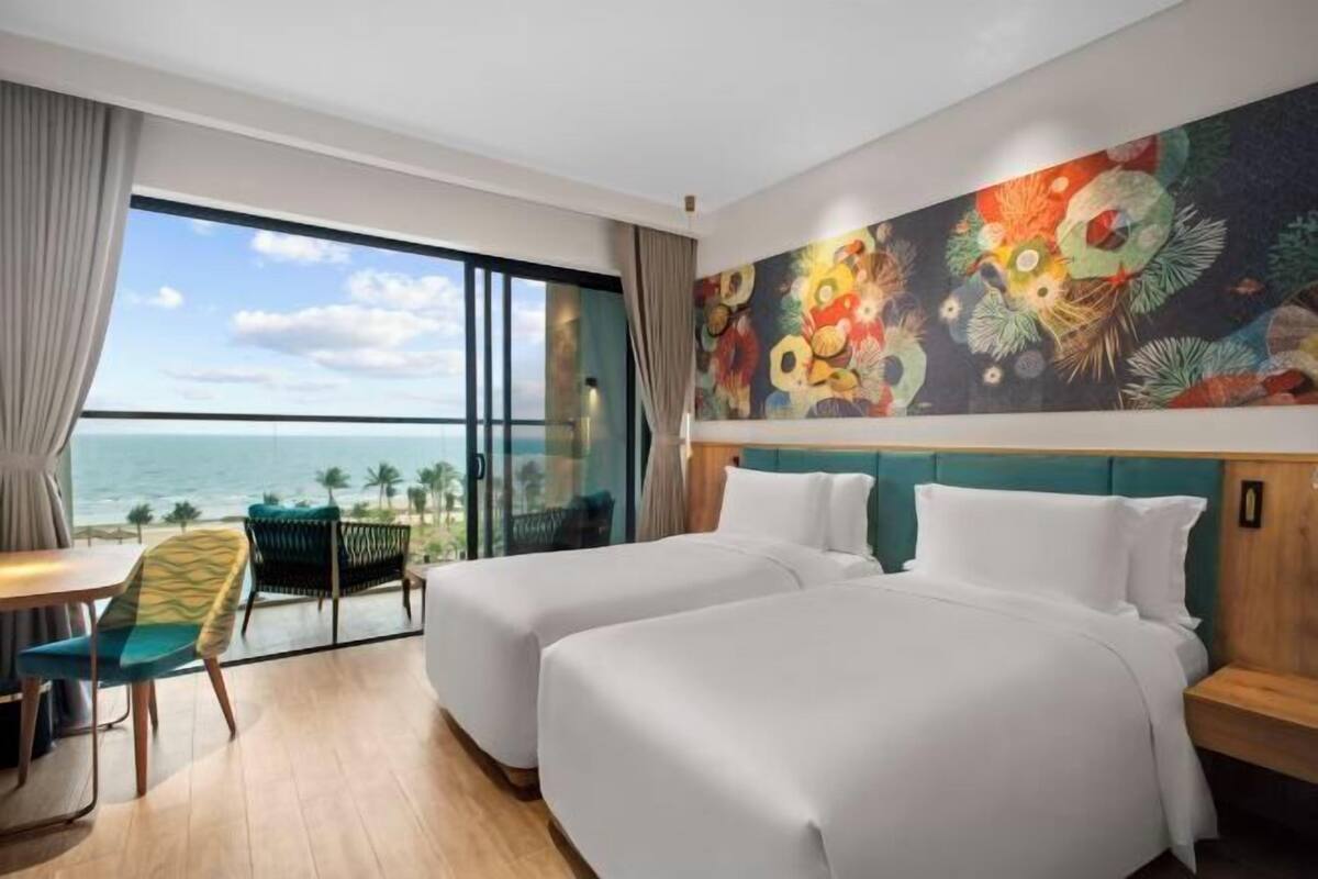 Premium bedding, down duvets, in-room safe, desk