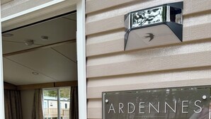 A modern interior with a sign reading "ARDENNES 38 x 12 - 3B SWIFT WiFi". - The Springer Van - Beautiful, luxury static (Aberlour)