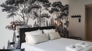 Familie suite | Luxe beddengoed, een minibar, een kluis op de kamer, een bureau