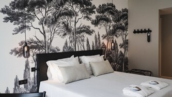 家庭套房 | 高档床上用品、迷你吧、客房内保险箱、办公桌