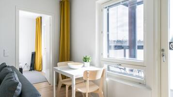 Standard Apartment, 1 Bedroom, Balcony | In-room dining