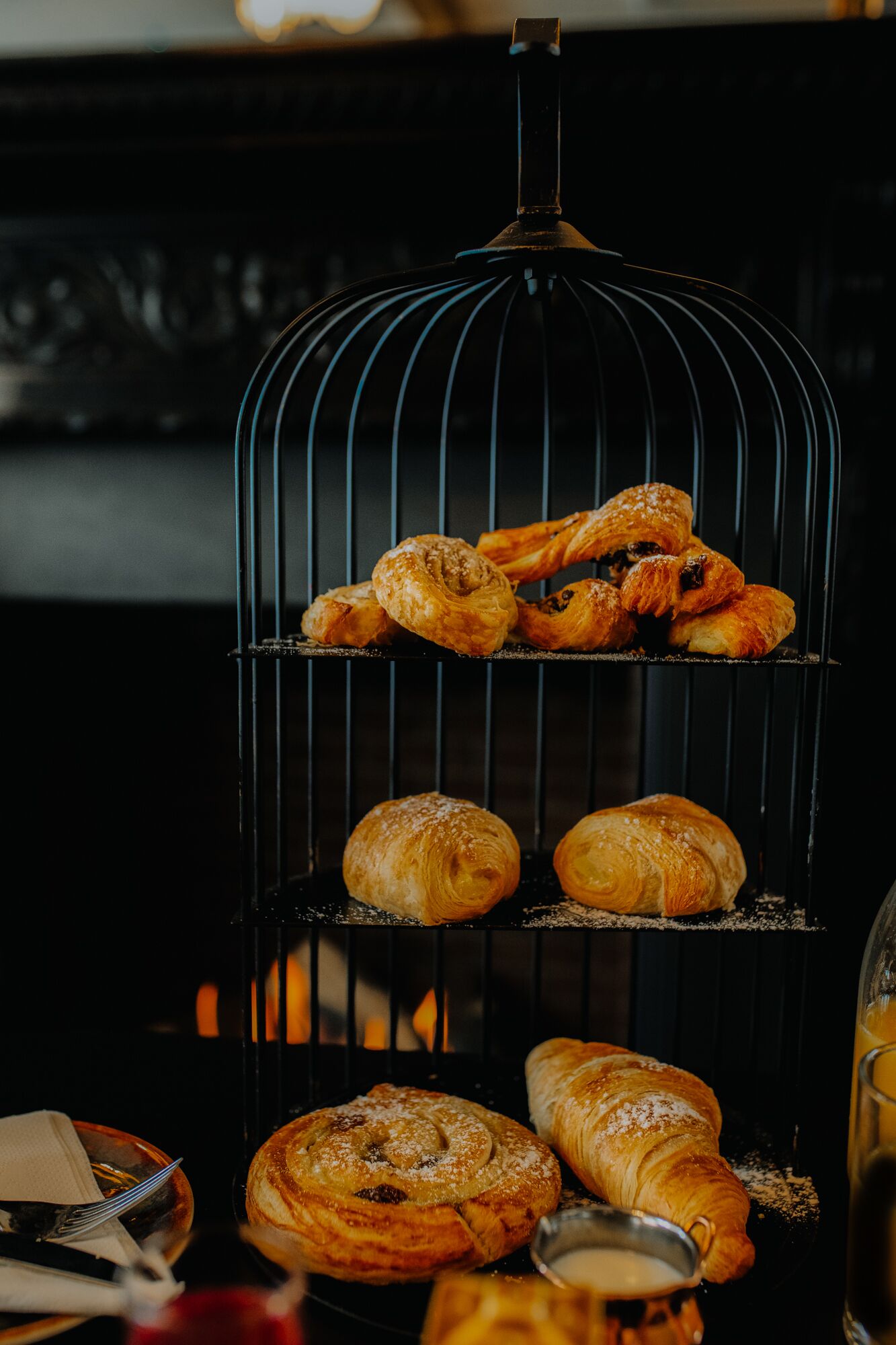 A display of pastries on a wire rack.