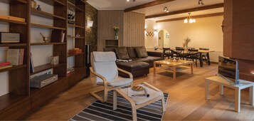 Superior Apartment | Living area | 30-inch LED TV with cable channels, TV