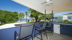 Property grounds - Fantastic beachfront home suitable for a couple or family group. (Picnic Bay)