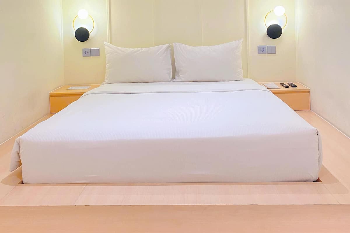 Deluxe tweepersoonskamer | Een bureau, een laptopwerkplek, gratis wifi, beddengoed