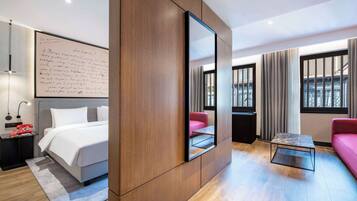 Superior Room | Minibar, in-room safe, individually decorated, desk