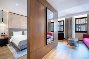 Superior Room | Minibar, in-room safe, individually decorated, desk