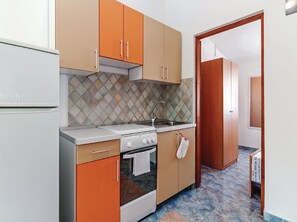 Apartment (One Bedroom Apartment with Terrace an) | Private kitchen | Fridge