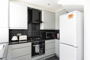 Fridge, coffee/tea maker, cookware/dishes/utensils, spices - Skyvillion Apartments - Ascot Gardens Enfield - 2Bed House with Garden w/Parking (Greater London)