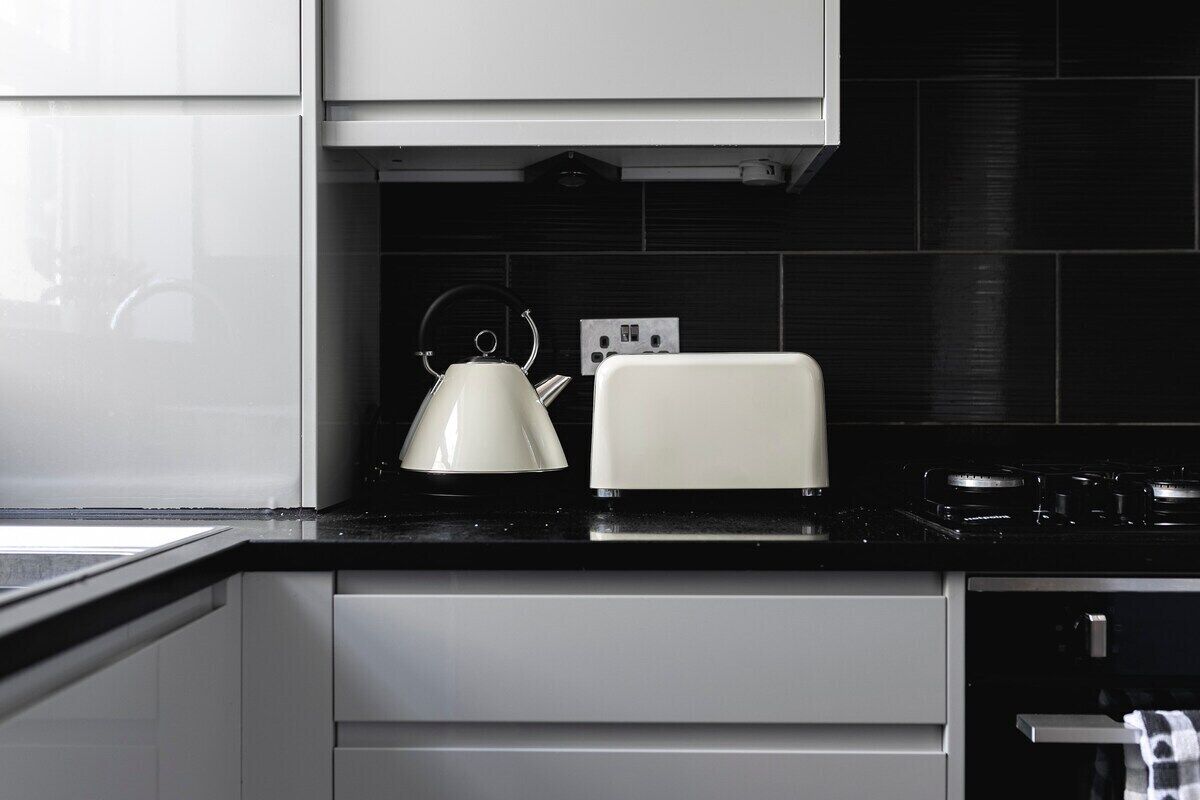 Fridge, coffee/tea maker, cookware/dishes/utensils, spices