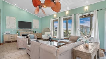 Smart TV, chimenea, videojuegos, mesa de ping pong