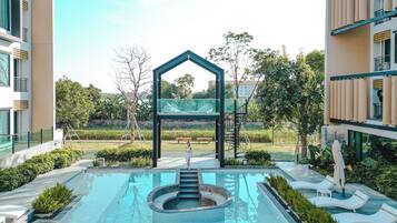 Outdoor pool, open 7:00 AM to 7:00 PM, pool umbrellas, sun loungers