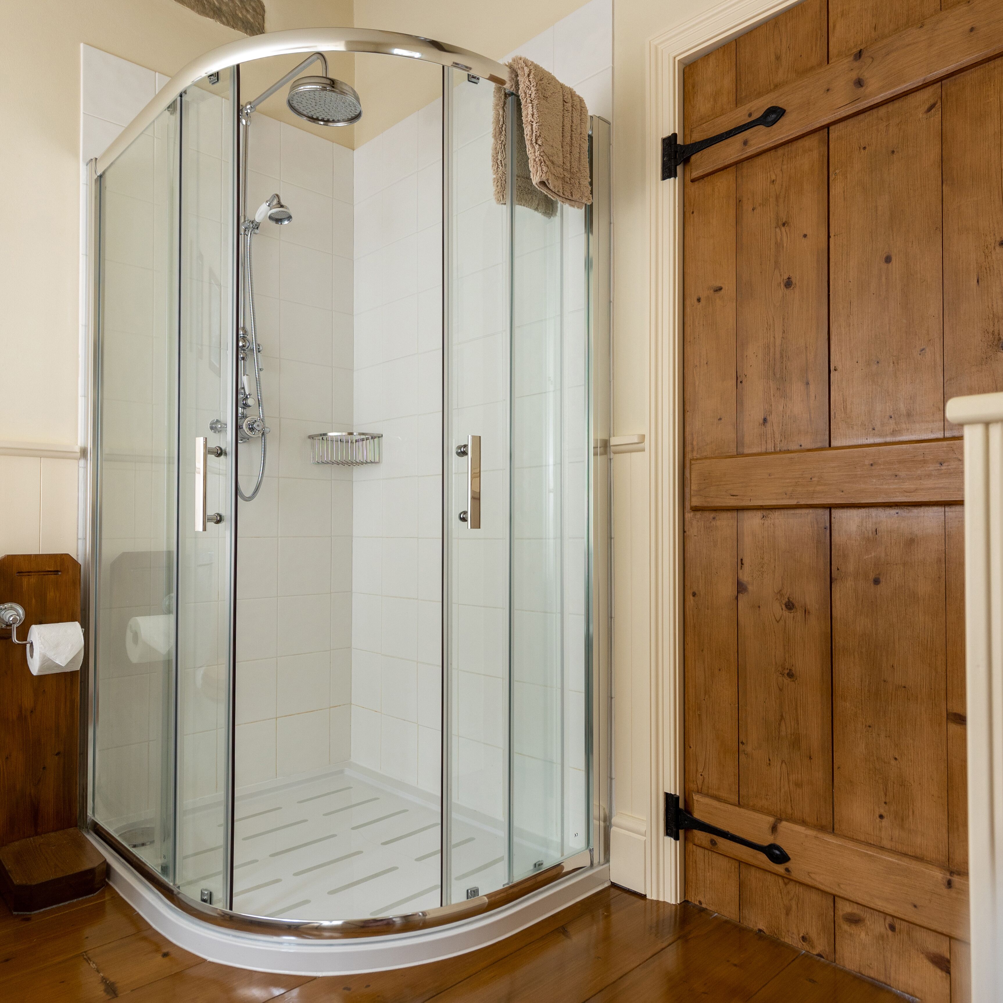 Shower, hair dryer, towels, toilet paper