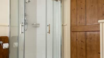 Shower, hair dryer, towels, toilet paper