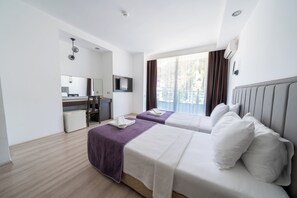 Minibar, ljudisolering, gratis fast internet och sängkläder