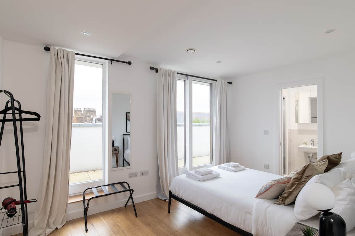 2 bedrooms, premium bedding, individually decorated, laptop workspace