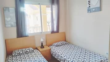 2 bedrooms, in-room safe, iron/ironing board, travel cot
