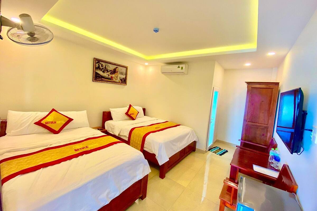Premium bedding, desk, laptop workspace, free WiFi