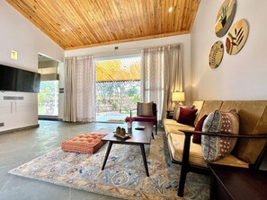 Luxury Villa, Private Pool (with Courtyard) | Living area | 55-inch LED TV with cable channels, TV - Brij Bageecha Jaipur - Private Villas with Heated Plunge Pool (Jamwa Ramgarh)