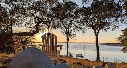 Exquisite lakefront home with kayaks, balcony, hammock, lake view swing, & W/D