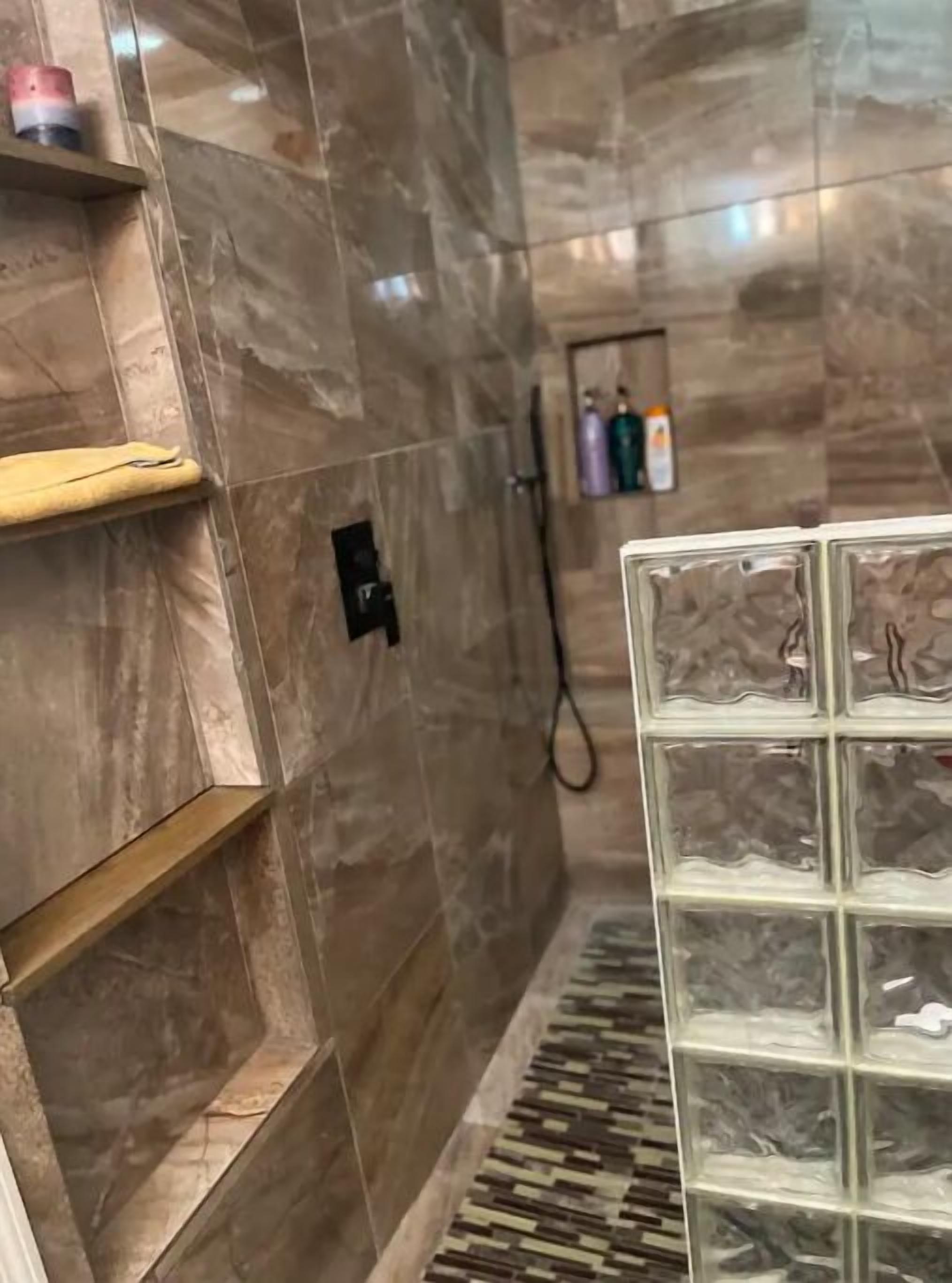 Shower, towels, soap, shampoo