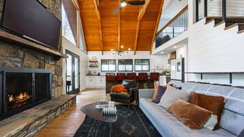 TV connectée, cheminée, table de tennis de table