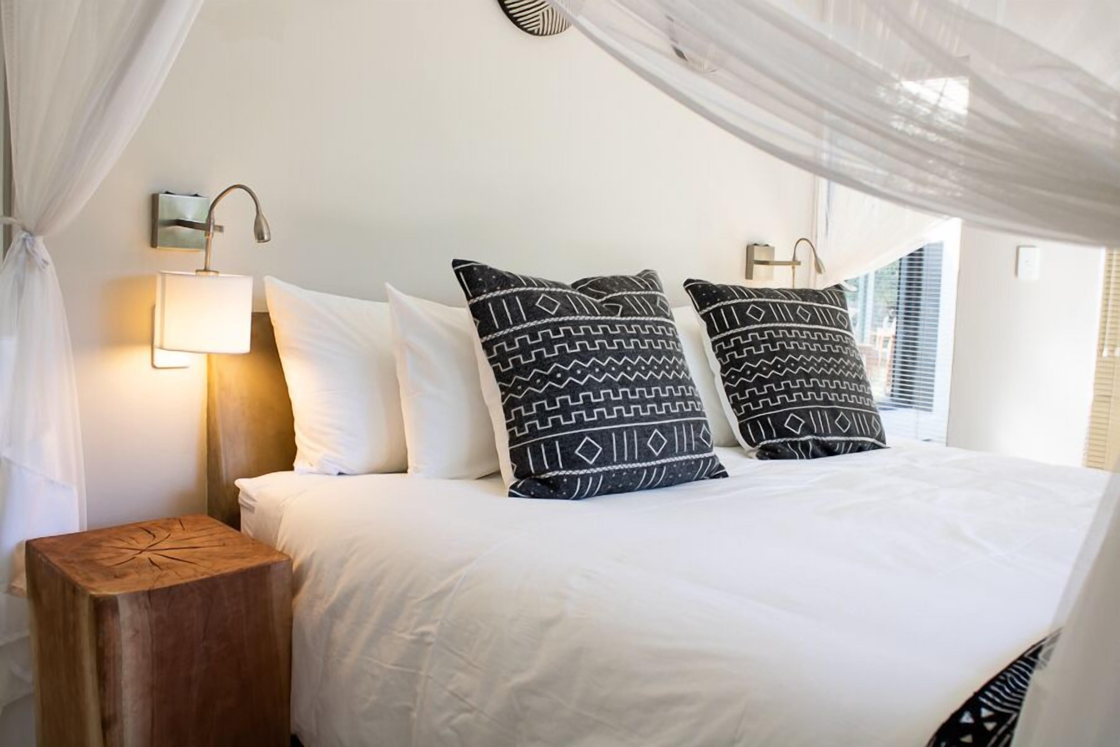 Premium bedding, pillow-top beds, in-room safe, individually decorated