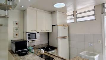 Apartment | Private kitchen | Full-sized fridge, microwave, blender, cookware/dishes/utensils
