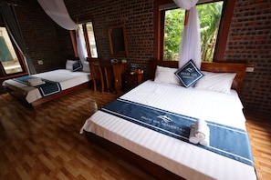 Premium bedding, down duvets, free minibar items, individually decorated - Pham Gia Homestay Ecogarden  (Gia Vien)