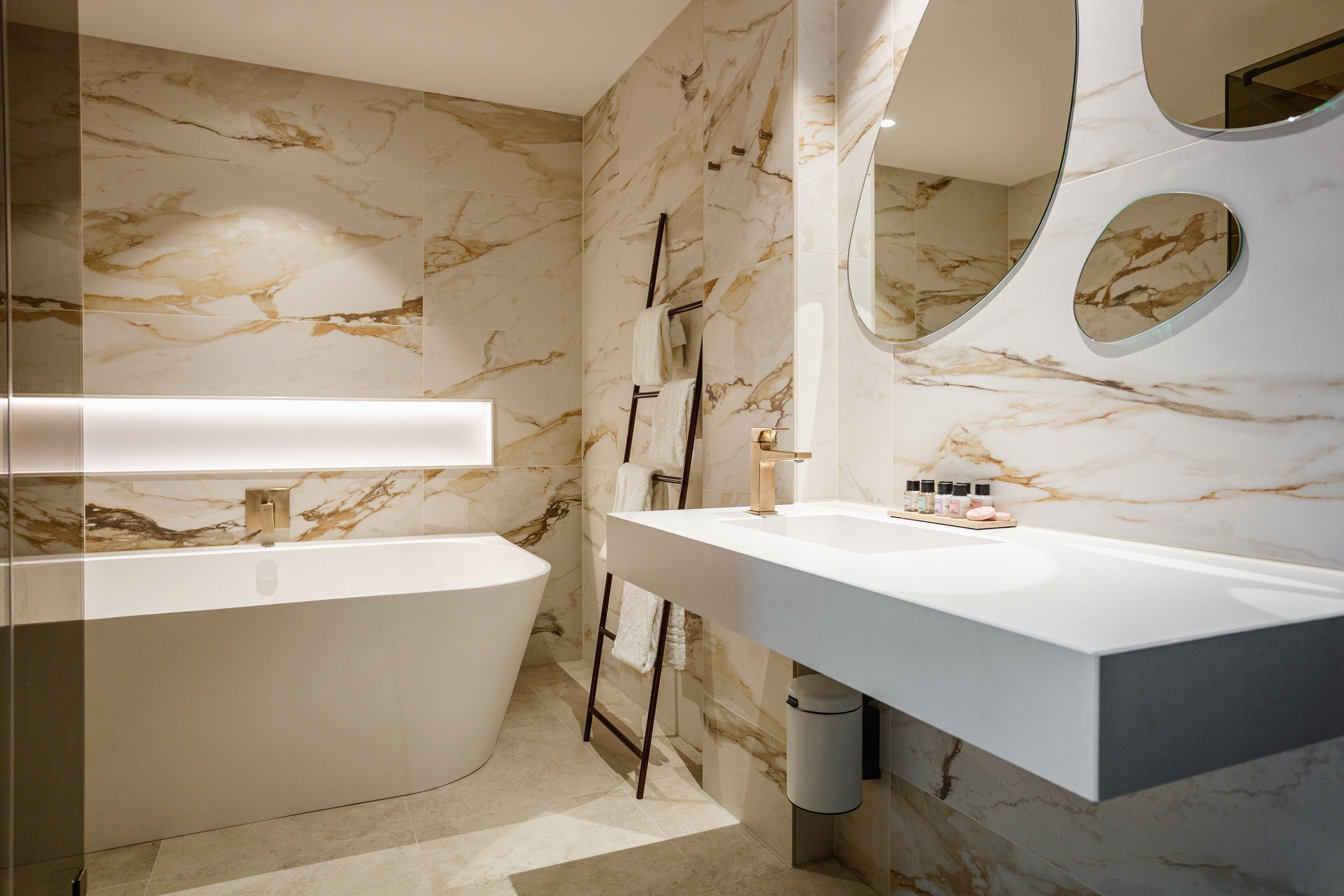 hair dryer, towels, soap, shampoo