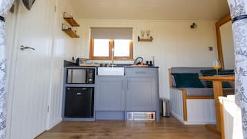 Fridge, electric kettle, toaster, cookware/dishes/utensils
