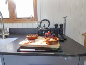 Fridge, electric kettle, toaster, cookware/dishes/utensils