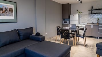 Standard Apartment | Living area | Flat-screen TV