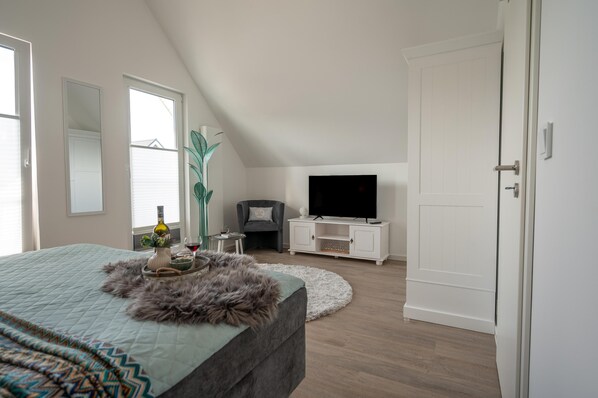 2 quartos, ferros/tábuas de passar roupa, berço de viagem