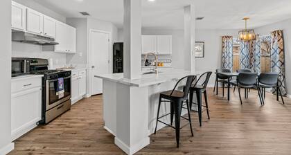 Modern home w/ garage, big yard, pool 4 mins away!