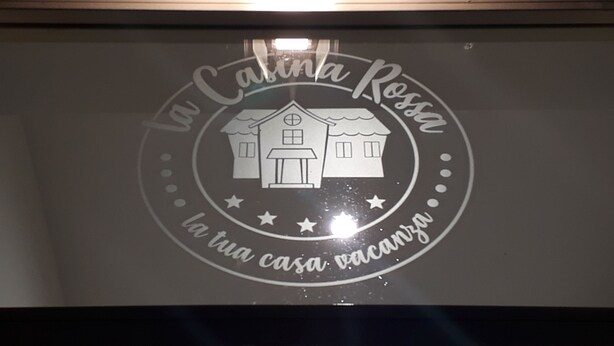 A logo with a house and stars, and the text "la tu casa vacanza". - Casina Rossa (Naples)