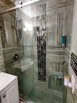 Hair dryer, towels, soap, shampoo