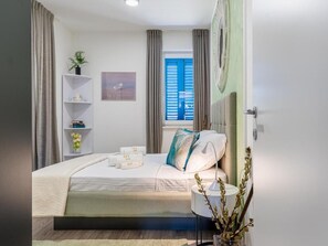 3 habitaciones, tabla de planchar con plancha, wifi y ropa de cama 