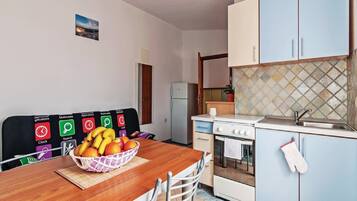 Fridge, microwave, oven, cookware/dishes/utensils