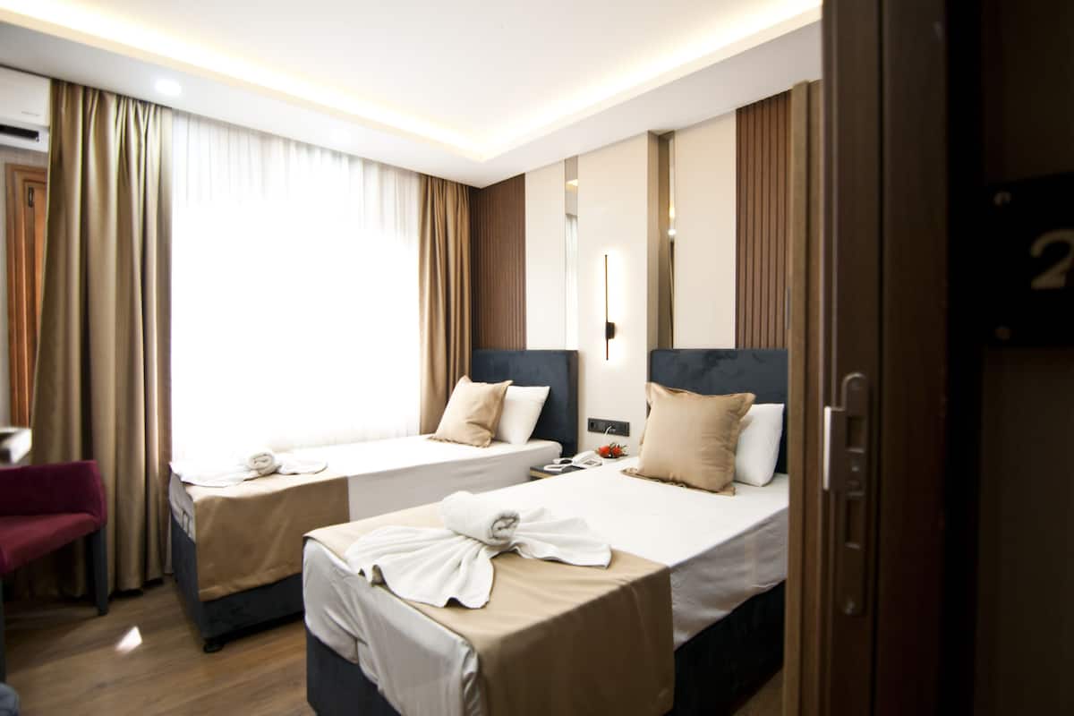 Premium bedding, minibar, desk, laptop workspace