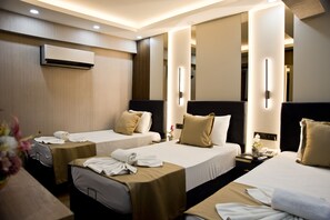 Triple Room | Premium bedding, minibar, desk, laptop workspace - Grand Bagoz Hotel (Istanbul)