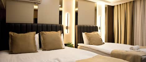 Triple Room | Premium bedding, minibar, desk, laptop workspace