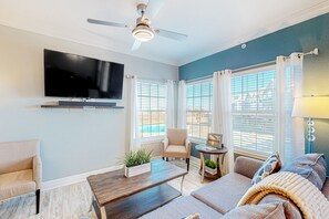 TV - Modern, second-floor condo steps to beach with balcony, W/D, & pool access (Corpus Christi)