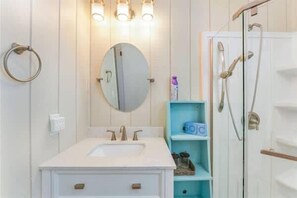 Shower, hair dryer, towels