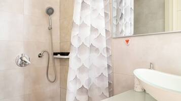 Hair dryer, towels, soap, shampoo